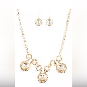 Beautiful gold tone necklace with matching earring set